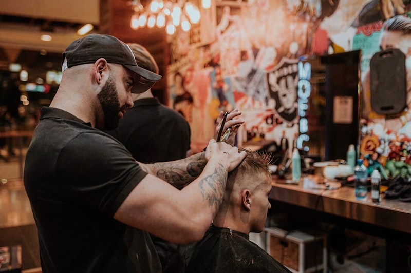 Barber mid cut with a walk-in client